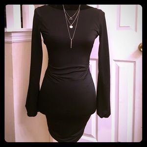 Petite black cocktail mini dress with open back